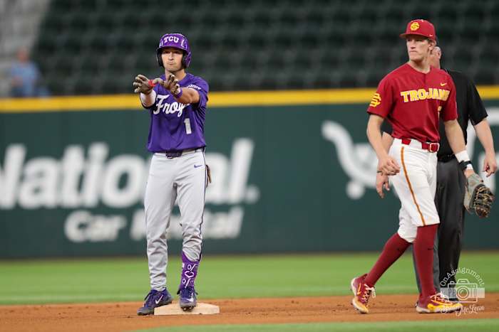 Peyton Chatagnier (1) stands at second base after a leadoff double.